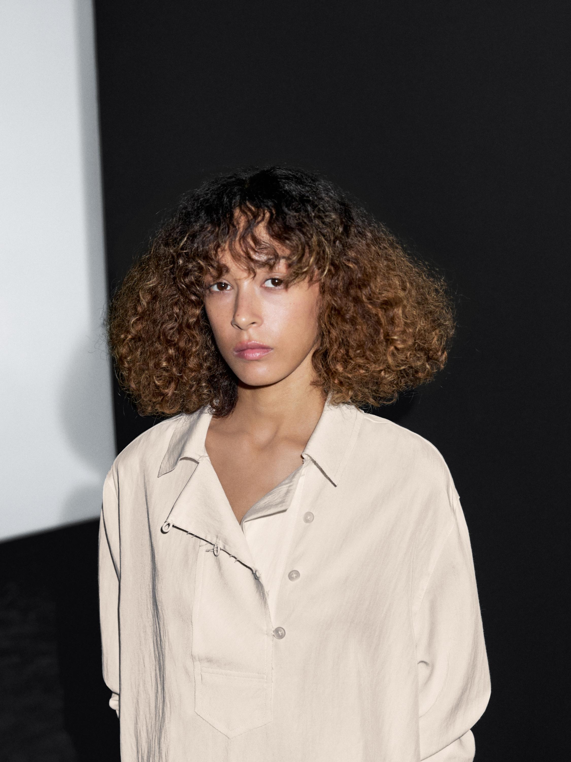 Flowing blouse with button detail